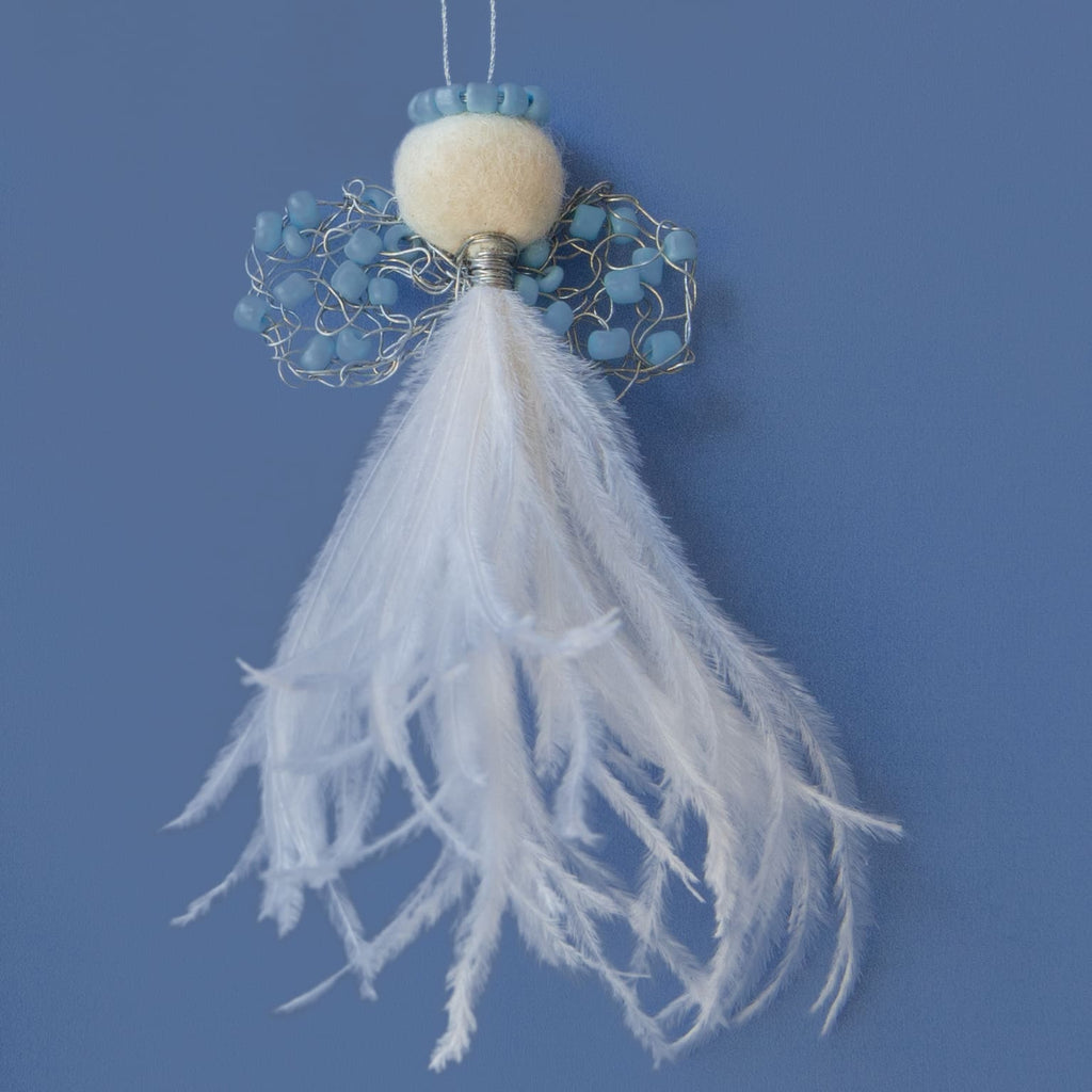 delicate angel decoration with a white feather bodice, wire wings with light blue beads and a felted wool head with light blue beaded halo