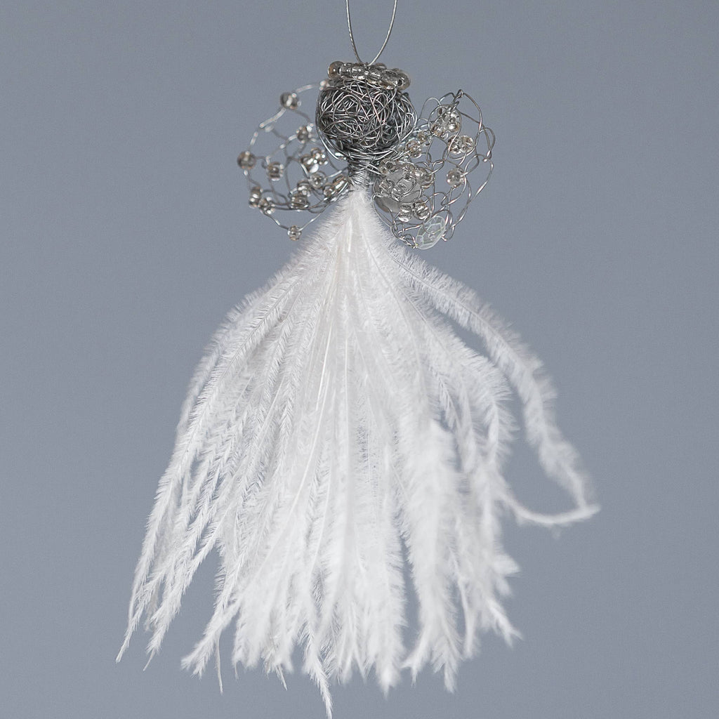 delicate angel decoration with a white feather bodice, wire wings with clear nbeads and a wire head with a clear beaded halo