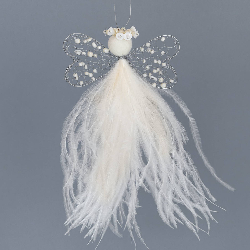 Karoo Angel. Charlene meaning I am free.  Knit double heart shape wire wing with cream beads, a felted wool head with a cream halo and cream coloured ostrich feather 'skirt'