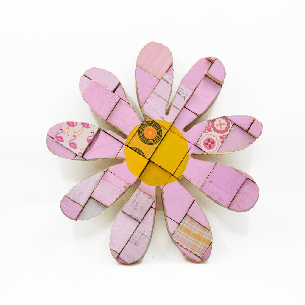 sweet colourful daisy wall art in shades of pink with yellow and  a hint of pattern.  Handmade of repurposed wood offcuts
