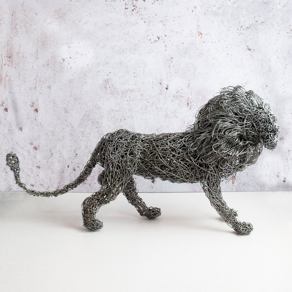 side view of exquisite wire lion of hand twisted galvanized steel wire 