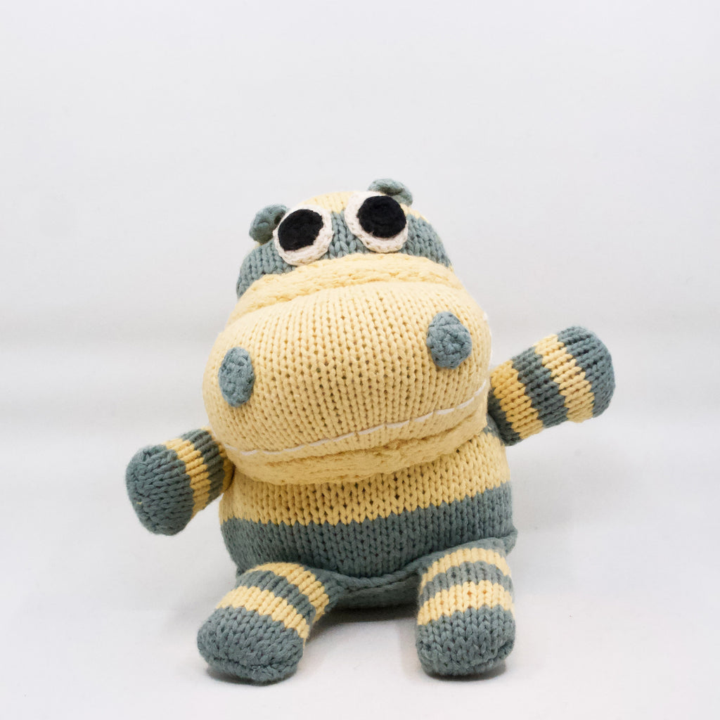 snuggly artisan knit hippo in light blue and yellow