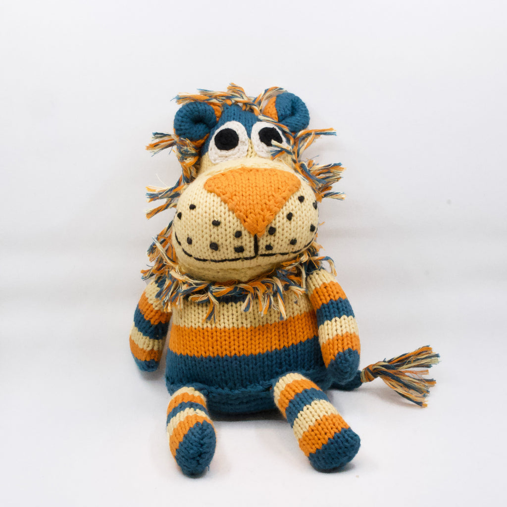 hand knit lion stuffy in orange, blue and yellow