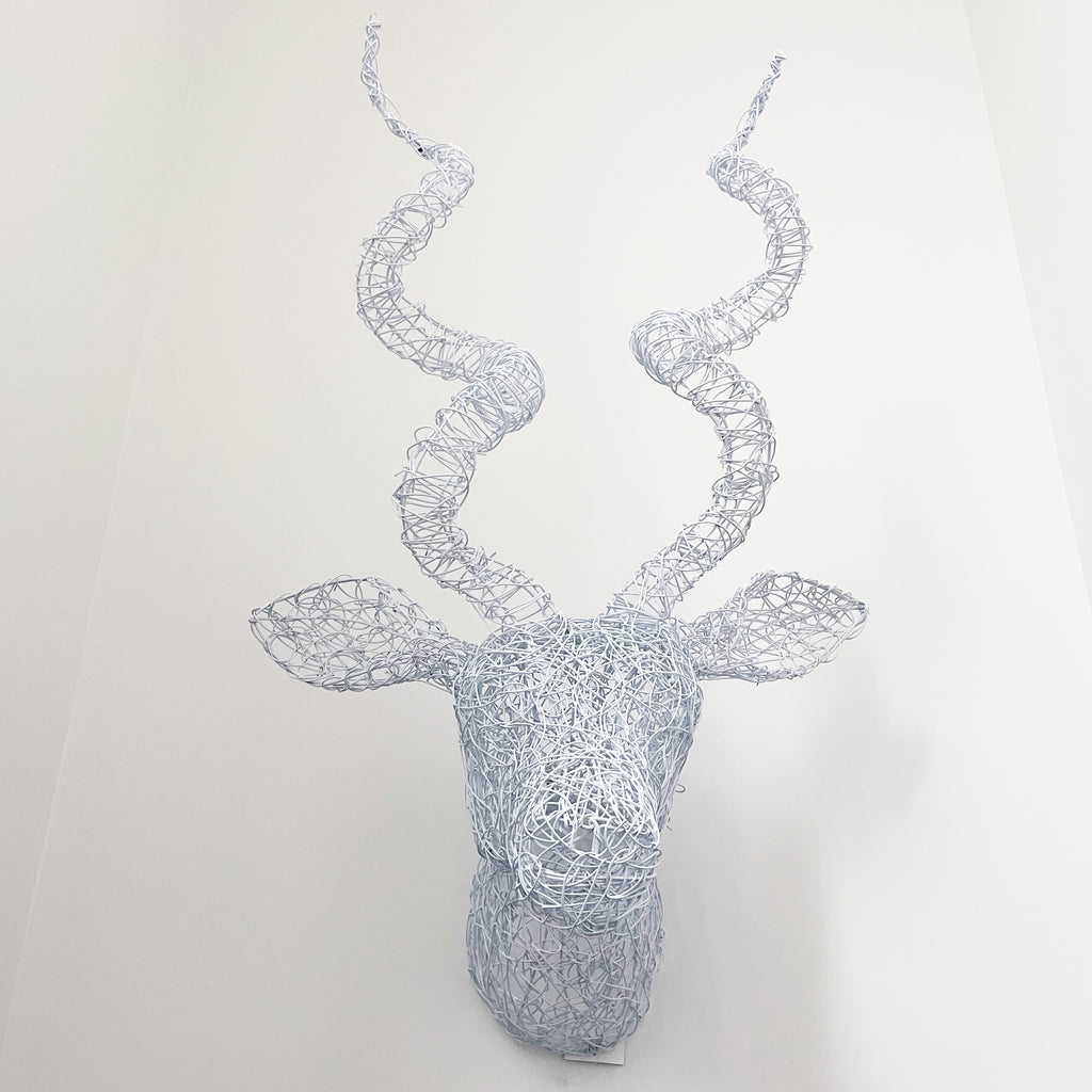 large almost life size white poweder coated kudu head wall art of hand twisted wire
