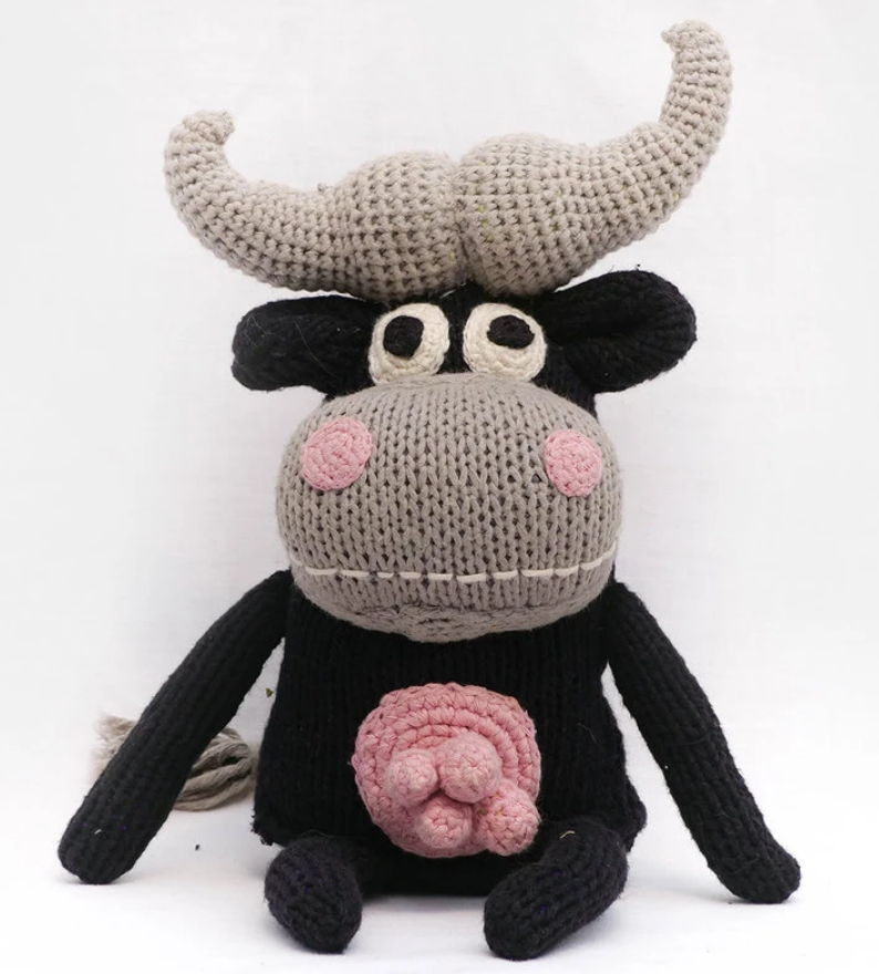 snuggly artisan Knit Cape Buffalo Cow with big horns and four pink teats