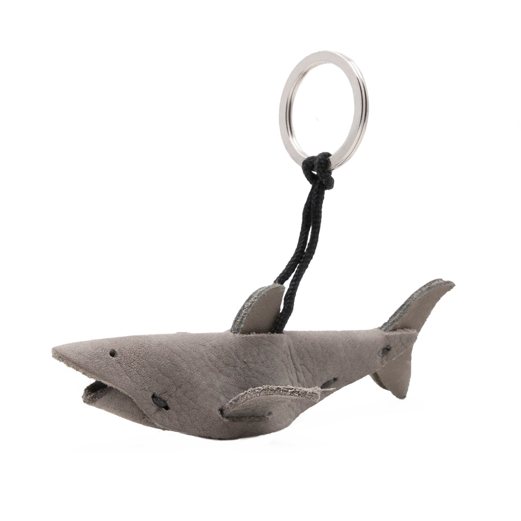 artisan crafted hand stitched Shark Keychain. warm gray leather suede.
