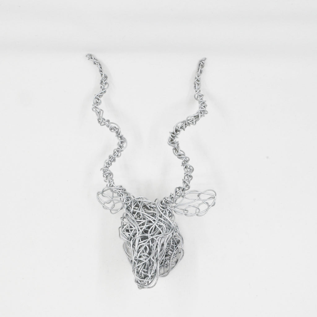 mini kudu head wall art of galvanized wire. Wire is twisted and manipulated entirely by hand