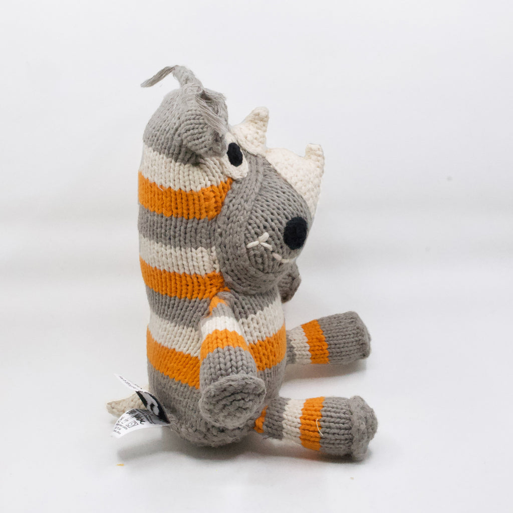 side view artisan knit rhino stuffed toy