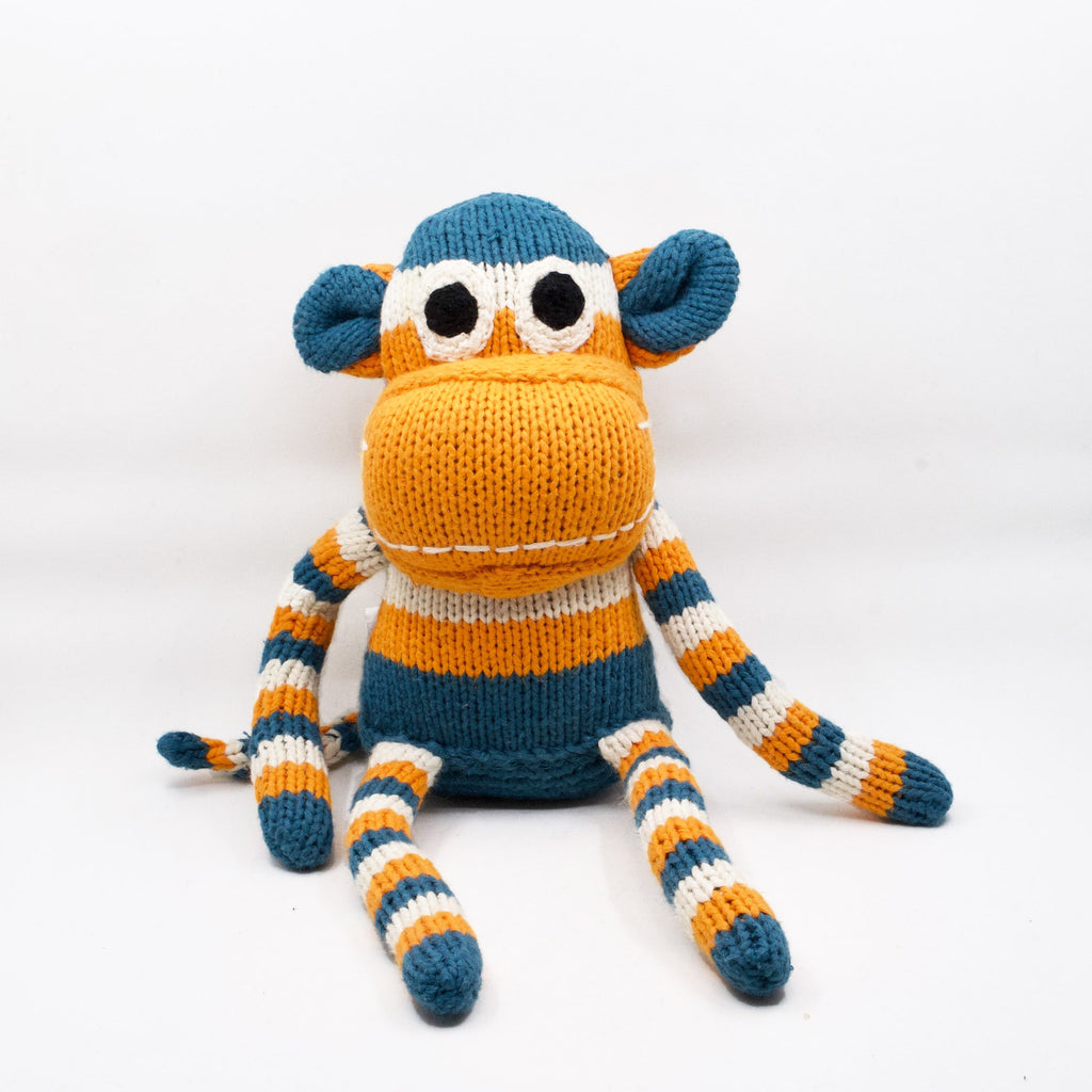 artisan knit snuggle monkey in orange, blue and white stripes